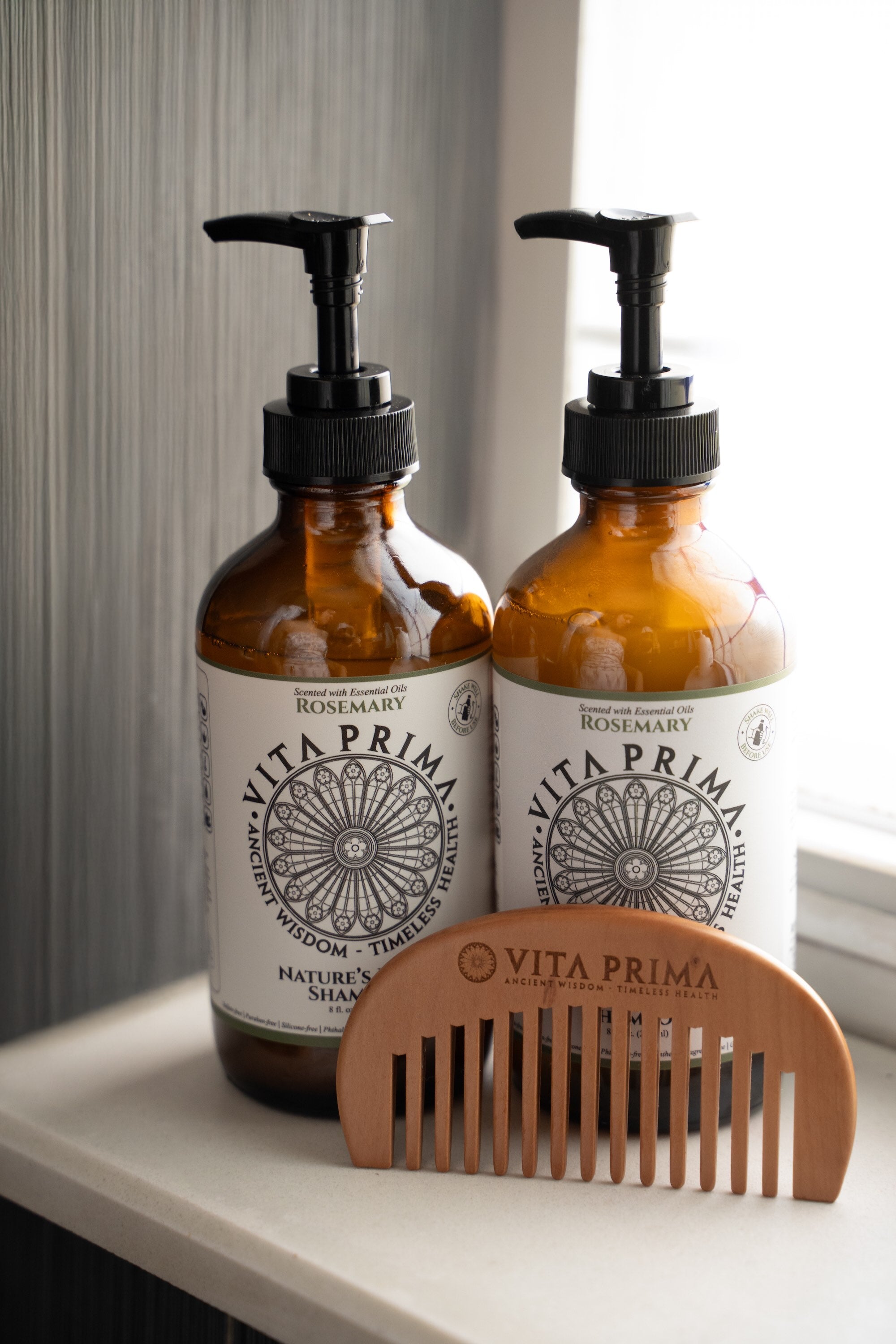 Vita Prima beechwood shower comb paired with Nature’s Elixir shampoo and conditioner
