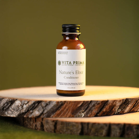 Vita Prima Nature's Elixir bottle on a wooden surface with a green background